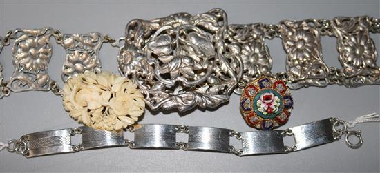 A silver plated ladys belt, a silver bracelet and two brooches